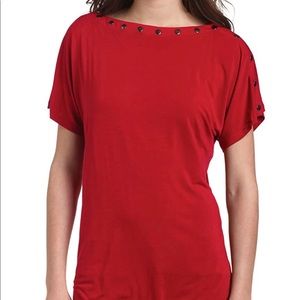 Red tunic with snaps embelishment